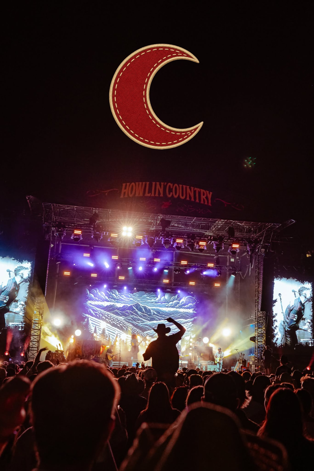 A packed nighttime crowd watching the illuminated Howlin' Country stage